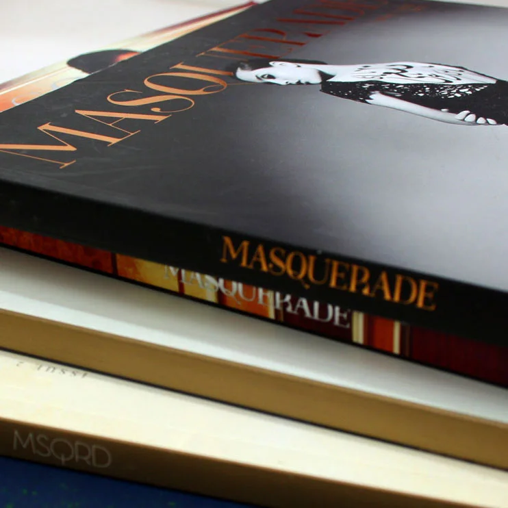 a photo of a stack of Masquerade Magazines with the spines showing